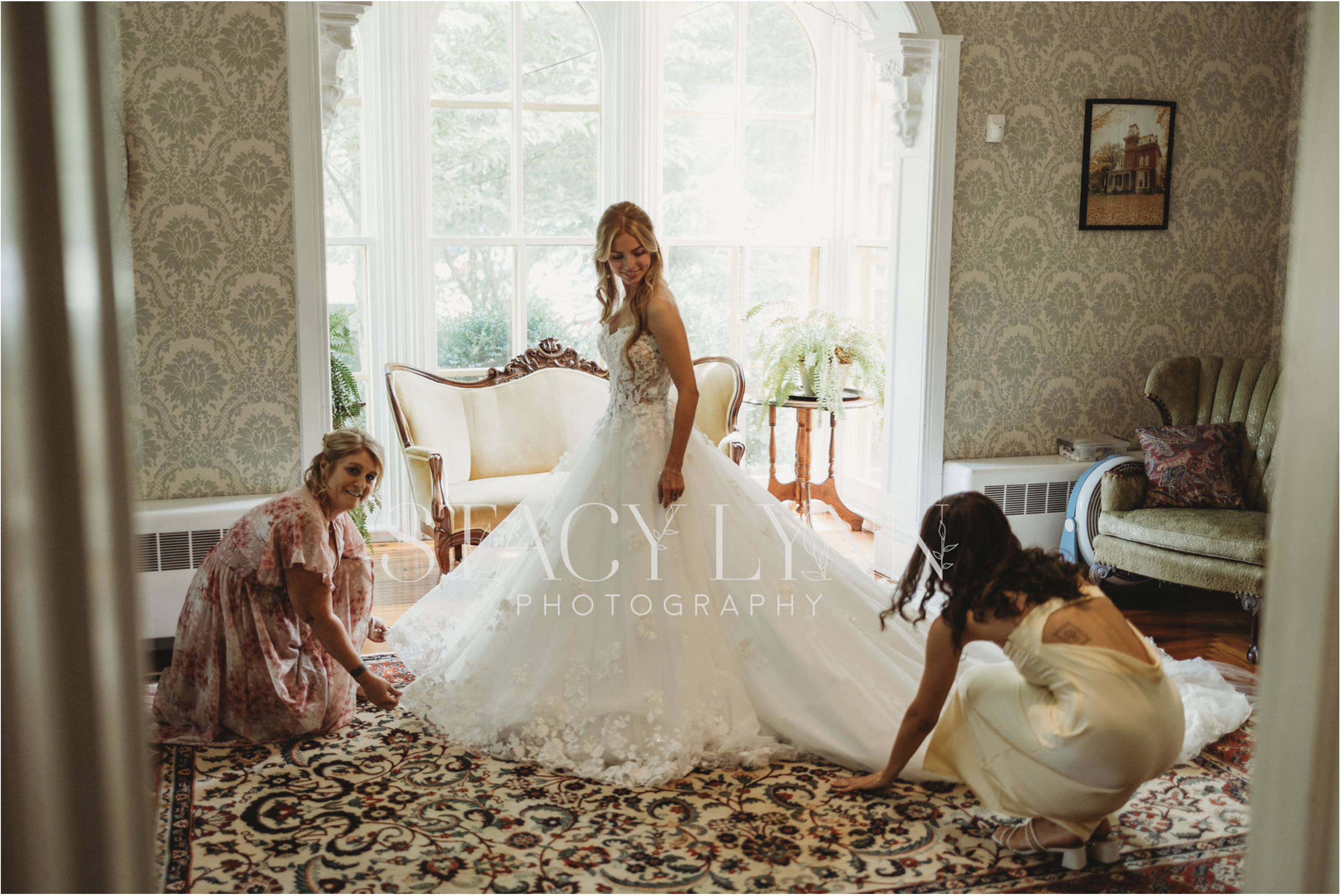 Bride with bouquet on settee