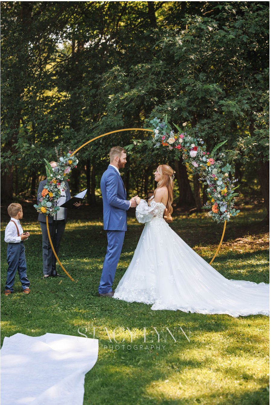 Ceremony at floral arch